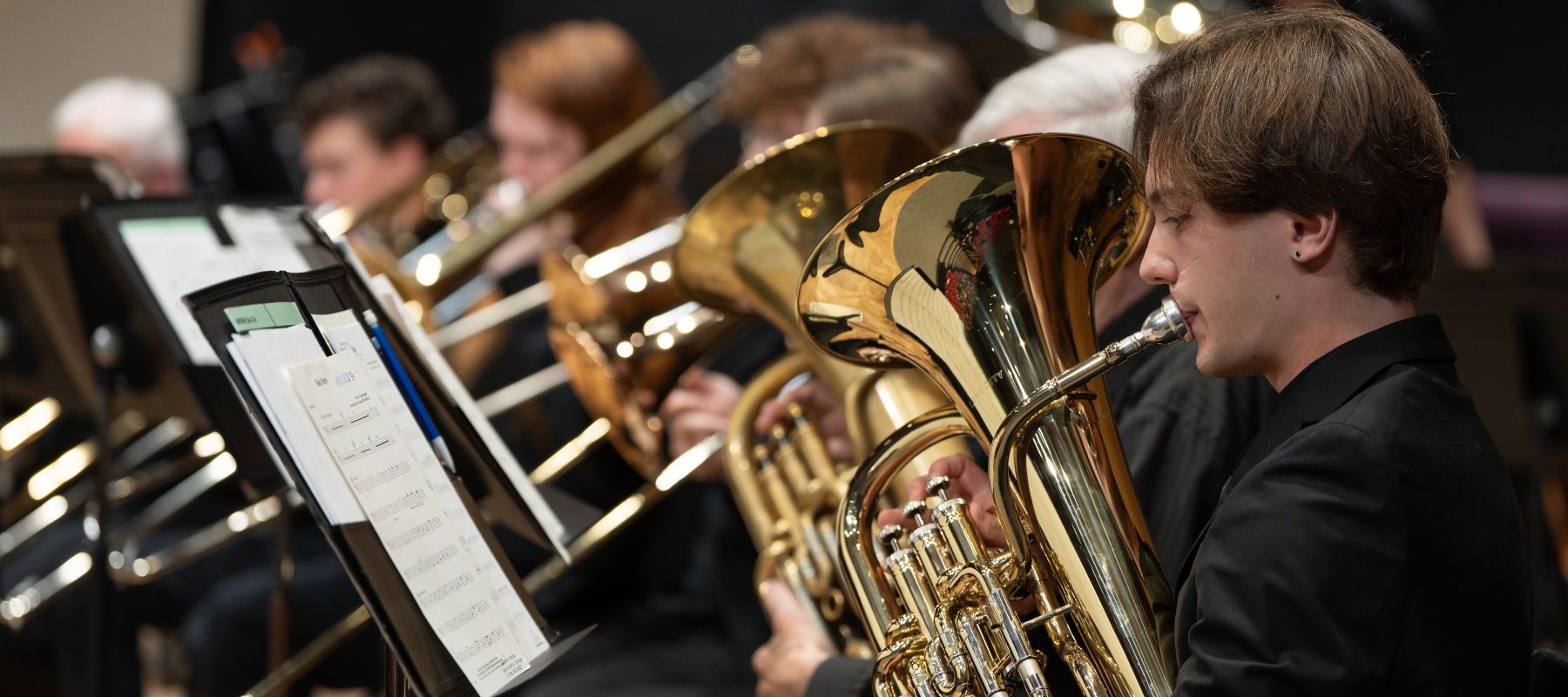 Student pursuing an associate's degree in music playing piano 